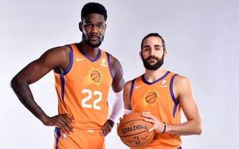 PHOENIX, AZ - SEPTEMBER 30: Deandre Ayton #22 and Ricky Rubio #11 of the Phoenix Suns poses for a portrait during media day on September 30, 2019 at Talking Stick Resort Arena in Phoenix, Arizona. NOTE TO USER: User expressly acknowledges and agrees that, by downloading and or using this Photograph, user is consenting to the terms and conditions of the Getty Images License Agreement. Mandatory Copyright Notice: Copyright 2019 NBAE (Photo by Barry Gossage NBAE via Getty Images)