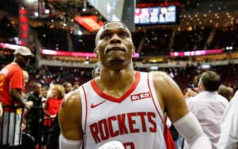 HOUSTON, TX - OCTOBER 26:  Russell Westbrook #0 of the Houston Rockets tosses his shoe to a fan after the game against the New Orleans Pelicans at Toyota Center on October 26, 2019 in Houston, Texas.  NOTE TO USER: User expressly acknowledges and agrees that, by downloading and or using this photograph, User is consenting to the terms and conditions of the Getty Images License Agreement.  (Photo by Tim Warner/Getty Images)