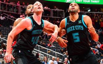 ATLANTA, GA - NOVEMBER 25: Cody Zeller #40 and Nicolas Batum #5 of the Charlotte Hornets fight for position against the Atlanta Hawks on November 25, 2018 at State Farm Arena in Atlanta, Georgia.  NOTE TO USER: User expressly acknowledges and agrees that, by downloading and/or using this Photograph, user is consenting to the terms and conditions of the Getty Images License Agreement. Mandatory Copyright Notice: Copyright 2018 NBAE (Photo by Scott Cunningham/NBAE via Getty Images)