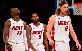 NEW YORK, NEW YORK - MARCH 30: Kelly Olynyk #9, Derrick Jones Jr. #5, and Bam Adebayo #13 of the Miami Heat react during the second half of the game against the New York Knicks at Madison Square Garden on March 30, 2019 in New York City. NOTE TO USER: User expressly acknowledges and agrees that, by downloading and or using this photograph, User is consenting to the terms and conditions of the Getty Images License Agreement. (Photo by Sarah Stier/Getty Images)