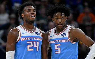 SALT LAKE CITY, UT - NOVEMBER 21: Buddy Hield #24 and teammate De'Aaron Fox #5 of the Sacramento Kings talk on court in a NBA game against the Utah Jazz at Vivint Smart Home Arena on November 21, 2018 in Salt Lake City, Utah. NOTE TO USER: User expressly acknowledges and agrees that, by downloading and or using this photograph, User is consenting to the terms and conditions of the Getty Images License Agreement. (Photo by Gene Sweeney Jr./Getty Images)