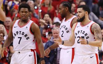 TORONTO, ONTARIO - JUNE 02:  Kyle Lowry #7 and Fred VanVleet #23 of the Toronto Raptors react against the Golden State Warriors in the first half during Game Two of the 2019 NBA Finals at Scotiabank Arena on June 02, 2019 in Toronto, Canada.  NOTE TO USER: User expressly acknowledges and agrees that, by downloading and or using this photograph, User is consenting to the terms and conditions of the Getty Images License Agreement. (Photo by Gregory Shamus/Getty Images)