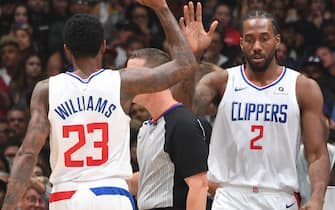 LOS ANGELES, CA - OCTOBER 28: Lou Williams #23 and Kawhi Leonard #2 of the LA Clippers high five against the Charlotte Hornets on October 28, 2019 at STAPLES Center in Los Angeles, California. NOTE TO USER: User expressly acknowledges and agrees that, by downloading and/or using this Photograph, user is consenting to the terms and conditions of the Getty Images License Agreement. Mandatory Copyright Notice: Copyright 2019 NBAE (Photo by Andrew D. Bernstein/NBAE via Getty Images)