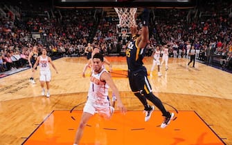 PHOENIX, AZ - OCTOBER 28: Donovan Mitchell #45 of the Utah Jazz dunks the ball against the Phoenix Suns on October 28, 2019 at Talking Stick Resort Arena in Phoenix, Arizona. NOTE TO USER: User expressly acknowledges and agrees that, by downloading and or using this photograph, user is consenting to the terms and conditions of the Getty Images License Agreement. Mandatory Copyright Notice: Copyright 2019 NBAE (Photo by Barry Gossage/NBAE via Getty Images)