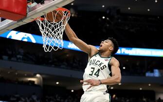 MILWAUKEE, WISCONSIN - APRIL 28:  Giannis Antetokounmpo #34 of the Milwaukee Bucks dunks the ball in the third quarter against the Boston Celtics during Game One of Round Two of the 2019 NBA Playoffs at the Fiserv Forum on April 28, 2019 in Milwaukee, Wisconsin. NOTE TO USER: User expressly acknowledges and agrees that, by downloading and or using this photograph, User is consenting to the terms and conditions of the Getty Images License Agreement. (Photo by Dylan Buell/Getty Images)