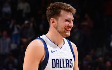 DENVER, CO - OCTOBER 29: Luka Doncic #77 of the Dallas Mavericks smiles against the Denver Nuggets on October 29, 2019 at the Pepsi Center in Denver, Colorado. NOTE TO USER: User expressly acknowledges and agrees that, by downloading and/or using this Photograph, user is consenting to the terms and conditions of the Getty Images License Agreement. Mandatory Copyright Notice: Copyright 2019 NBAE (Photo by Bart Young/NBAE via Getty Images)