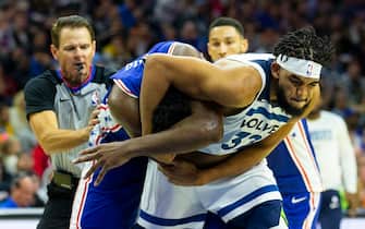 PHILADELPHIA, PA - OCTOBER 30: Joel Embiid #21 of the Philadelphia 76ers gets in a fight with Karl-Anthony Towns #32 of the Minnesota Timberwolves in the third quarter at the Wells Fargo Center on October 30, 2019 in Philadelphia, Pennsylvania. NOTE TO USER: User expressly acknowledges and agrees that, by downloading and or using this photograph, User is consenting to the terms and conditions of the Getty Images License Agreement. (Photo by Mitchell Leff/Getty Images)
