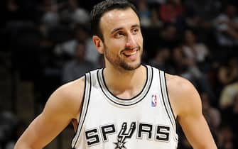 SAN ANTONIO - JANUARY 23:  Manu Ginobili #20 of the San Antonio Spurs looks on with a smile during the game against the New Jersey Nets at AT&T Center on January 23, 2009 in San Antonio, Texas.  The Spurs won 94-91.  NOTE TO USER: User expressly acknowledges and agrees that, by downloading and/or using this Photograph, user is consenting to the terms and conditions of the Getty Images License Agreement. Mandatory Copyright Notice: Copyright 2009 NBAE (Photo by D. Clarke Evans/NBAE via Getty Images)