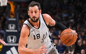 DENVER, CO - APRIL 3: Marco Belinelli #18 of the San Antonio Spurs handles the ball against the Denver Nuggets on April 3, 2019 at the Pepsi Center in Denver, Colorado. NOTE TO USER: User expressly acknowledges and agrees that, by downloading and/or using this Photograph, user is consenting to the terms and conditions of the Getty Images License Agreement. Mandatory Copyright Notice: Copyright 2019 NBAE (Photo by Garrett Ellwood/NBAE via Getty Images)