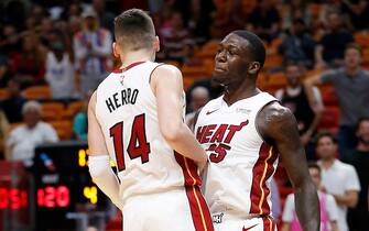 MIAMI, FLORIDA - OCTOBER 23:  Tyler Herro #14 and Kendrick Nunn #25 of the Miami Heat celebrate after a dunk against the Memphis Grizzlies during the second half at American Airlines Arena on October 23, 2019 in Miami, Florida. NOTE TO USER: User expressly acknowledges and agrees that, by downloading and/or using this photograph, user is consenting to the terms and conditions of the Getty Images License Agreement. (Photo by Michael Reaves/Getty Images)