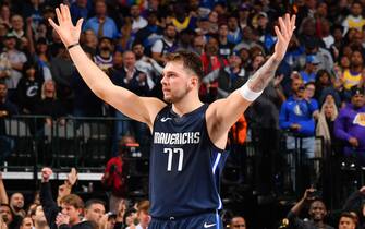 DALLAS, TX - NOVEMBER 1: Luka Doncic #77 of the Dallas Mavericks reacts to a play against the Los Angeles Lakers on November 1, 2019 at the American Airlines Center in Dallas, Texas. NOTE TO USER: User expressly acknowledges and agrees that, by downloading and/or using this Photograph, user is consenting to the terms and conditions of the Getty Images License Agreement. Mandatory Copyright Notice: Copyright 2019 NBAE (Photo by Jesse D. Garrabrant/NBAE via Getty Images)