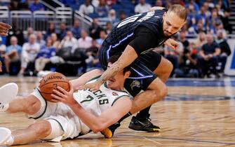 ORLANDO, FL - NOVEMBER 1:  Ersan Ilyasova #7 of the Milwaukee Bucks and Evan Fournier #10 of the Orlando Magic fights over a loose ball during the game at the Amway Center on November 1, 2019 in Orlando, Florida. The Bucks defeated the Magic 123 to 91. NOTE TO USER: User expressly acknowledges and agrees that, by downloading and or using this photograph, User is consenting to the terms and conditions of the Getty Images License Agreement. (Photo by Don Juan Moore/Getty Images) *** Local Caption *** Ersan Ilyasova; Evan Fournier
