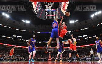 CHICAGO, ILLINOIS - NOVEMBER 01:  Zach LaVine #8 of the Chicago Bulls shoots over Christian Wood #35 of the Detroit Pistons during the first half of a game at United Center on November 01, 2019 in Chicago, Illinois. NOTE TO USER: User expressly acknowledges and agrees that, by downloading and or using this photograph, User is consenting to the terms and conditions of the Getty Images License Agreement. (Photo by Stacy Revere/Getty Images)
