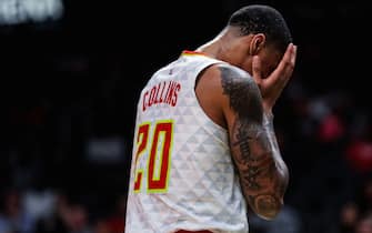 ATLANTA, GA - OCTOBER 7: John Collins #20 of the Atlanta Hawks reacts during a preseason game against the New Orleans Pelicans at State Farm Arena on October 7, 2019 in Atlanta, Georgia. NOTE TO USER: User expressly acknowledges and agrees that, by downloading and or using this photograph, User is consenting to the terms and conditions of the Getty Images License Agreement. (Photo by Carmen Mandato/Getty Images)