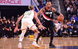 SAN FRANCISCO, CA - NOVEMBER 4: Damian Lillard #0 of the Portland Trail Blazers handles the ball against the Golden State Warriors on November 4, 2019 at Chase Center in San Francisco, California. NOTE TO USER: User expressly acknowledges and agrees that, by downloading and or using this photograph, user is consenting to the terms and conditions of Getty Images License Agreement. Mandatory Copyright Notice: Copyright 2019 NBAE (Photo by Noah Graham/NBAE via Getty Images)