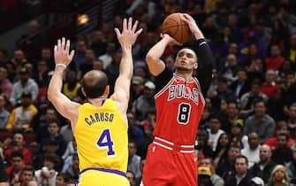 1185781513 CHICAGO, ILLINOIS - NOVEMBER 05: Zach LaVine #8 of the Chicago Bulls shoots over Alex Caruso #4 of the Los Angeles Lakers during the second half of a game at United Center on November 05, 2019 in Chicago, Illinois. NOTE TO USER: User expressly acknowledges and agrees that, by downloading and or using this photograph, User is consenting to the terms and conditions of the Getty Images License Agreement. (Photo by Stacy Revere/Getty Images)