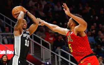 ATLANTA, GEORGIA - NOVEMBER 05:  DeMar DeRozan #10 of the San Antonio Spurs shoots against Jabari Parker #5 of the Atlanta Hawks in the second half at State Farm Arena on November 05, 2019 in Atlanta, Georgia.  NOTE TO USER: User expressly acknowledges and agrees that, by downloading and/or using this photograph, user is consenting to the terms and conditions of the Getty Images License Agreement.  (Photo by Kevin C. Cox/Getty Images)