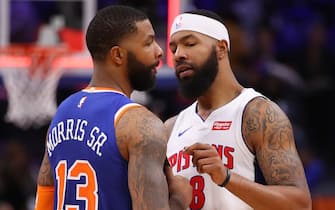 DETROIT, MICHIGAN - NOVEMBER 06: Markieff Morris #8 of the Detroit Pistons and Marcus Morris Sr. #13 of the New York Knicks talk after a game at Little Caesars Arena on November 06, 2019 in Detroit, Michigan. Detroit won the game 122-102. NOTE TO USER: User expressly acknowledges and agrees that, by downloading and/or using this photograph, user is consenting to the terms and conditions of the Getty Images License Agreement.  (Photo by Gregory Shamus/Getty Images)
