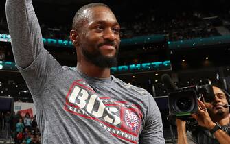 CHARLOTTE, NC - NOVEMBER 7: Kemba Walker #8 of the Boston Celtics watches his tribute video and thanks the crowd prior to a game against the Charlotte Hornets on November 7, 2019 at Spectrum Center in Charlotte, North Carolina. NOTE TO USER: User expressly acknowledges and agrees that, by downloading and or using this photograph, User is consenting to the terms and conditions of the Getty Images License Agreement.  Mandatory Copyright Notice:  Copyright 2019 NBAE (Photo by Kent Smith/NBAE via Getty Images)