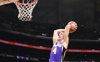 LOS ANGELES, CA - NOVEMBER 8: Alex Caruso #4 of the Los Angeles Lakers dunks the ball against the Miami Heat on November 8, 2019 at STAPLES Center in Los Angeles, California. NOTE TO USER: User expressly acknowledges and agrees that, by downloading and/or using this Photograph, user is consenting to the terms and conditions of the Getty Images License Agreement. Mandatory Copyright Notice: Copyright 2019 NBAE (Photo by Andrew D. Bernstein/NBAE via Getty Images)