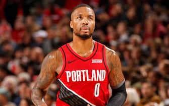 PORTLAND, OR - NOVEMBER 8: Damian Lillard #0 of the Portland Trail Blazers looks on against the Brooklyn Nets on November 8, 2019 at the Moda Center Arena in Portland, Oregon. NOTE TO USER: User expressly acknowledges and agrees that, by downloading and or using this photograph, user is consenting to the terms and conditions of the Getty Images License Agreement. Mandatory Copyright Notice: Copyright 2019 NBAE (Photo by Cameron Browne/NBAE via Getty Images)
