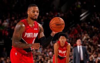 PORTLAND, OR - NOVEMBER 8: Damian Lillard #0 of the Portland Trail Blazers shoots a free throw against the Brooklyn Nets on November 8, 2019 at the Moda Center Arena in Portland, Oregon. NOTE TO USER: User expressly acknowledges and agrees that, by downloading and or using this photograph, user is consenting to the terms and conditions of the Getty Images License Agreement. Mandatory Copyright Notice: Copyright 2019 NBAE (Photo by Cameron Browne/NBAE via Getty Images)