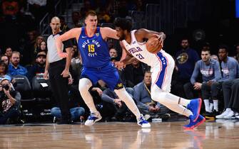 DENVER, CO - NOVEMBER 8: Joel Embiid #21 of the Philadelphia 76ers handles the ball against the Denver Nuggets on November 8, 2019 at the Pepsi Center in Denver, Colorado. NOTE TO USER: User expressly acknowledges and agrees that, by downloading and/or using this Photograph, user is consenting to the terms and conditions of the Getty Images License Agreement. Mandatory Copyright Notice: Copyright 2019 NBAE (Photo by Bart Young/NBAE via Getty Images)