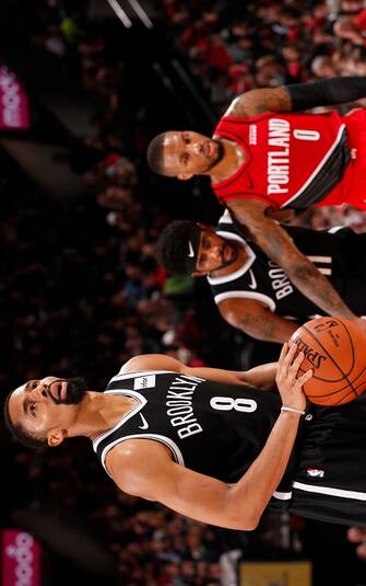 PORTLAND, OR - NOVEMBER 8: Spencer Dinwiddie #8 of the Brooklyn Nets shoots a free throw against the Portland Trail Blazers on November 8, 2019 at the Moda Center Arena in Portland, Oregon. NOTE TO USER: User expressly acknowledges and agrees that, by downloading and or using this photograph, user is consenting to the terms and conditions of the Getty Images License Agreement. Mandatory Copyright Notice: Copyright 2019 NBAE (Photo by Cameron Browne/NBAE via Getty Images)