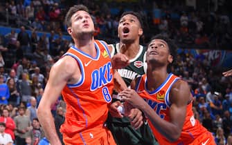 OKLAHOMA CITY, OK- NOVEMBER 10: Danilo Gallinari #8 of the Oklahoma City Thunder, Giannis Antetokounmpo #34 of the Milwaukee Bucks, and Shai Gilgeous-Alexander #2 of the Oklahoma City Thunder fight for the rebound on November 10, 2019 at Chesapeake Energy Arena in Oklahoma City, Oklahoma. NOTE TO USER: User expressly acknowledges and agrees that, by downloading and or using this photograph, User is consenting to the terms and conditions of the Getty Images License Agreement. Mandatory Copyright Notice: Copyright 2019 NBAE (Photo by Bill Baptist/NBAE via Getty Images)