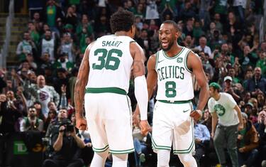 BOSTON, MA - NOVEMBER 11: Kemba Walker #8 of the Boston Celtics and Marcus Smart #36 of the Boston Celtics celebrate during the game against the Dallas Mavericks on November 11, 2019 at the TD Garden in Boston, Massachusetts.  NOTE TO USER: User expressly acknowledges and agrees that, by downloading and or using this photograph, User is consenting to the terms and conditions of the Getty Images License Agreement. Mandatory Copyright Notice: Copyright 2019 NBAE  (Photo by Brian Babineau/NBAE via Getty Images) 