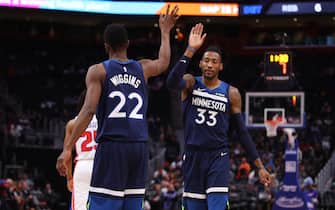 1187027547 DETROIT, MICHIGAN - NOVEMBER 11: Robert Covington #33 of the Minnesota Timberwolves celebrates a first half basket with Andrew Wiggins #22 while playing the Detroit Pistons at Little Caesars Arena on November 11, 2019 in Detroit, Michigan. NOTE TO USER: User expressly acknowledges and agrees that, by downloading and or using this photograph, User is consenting to the terms and conditions of the Getty Images License Agreement. (Photo by Gregory Shamus/Getty Images)