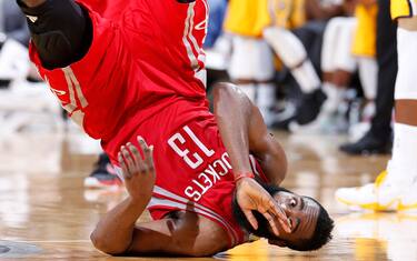 INDIANAPOLIS, IN - MARCH 27: James Harden #13 of the Houston Rockets falls over after drawing a foul against the Indiana Pacers in the second half of a game at Bankers Life Fieldhouse on March 27, 2016 in Indianapolis, Indiana. The Pacers defeated the Rockets 104-101. NOTE TO USER: User expressly acknowledges and agrees that, by downloading and or using the photograph, User is consenting to the terms and conditions of the Getty Images License Agreement. (Photo by Joe Robbins/Getty Images)