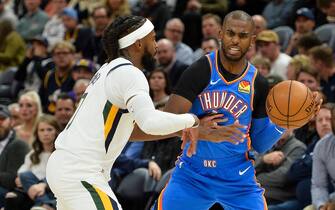 SALT LAKE CITY, UT - OCTOBER 23:  Mike Conley #10 of the Utah Jazz guards Chris Paul #3 of the Oklahoma City Thunder during an opening night game at Vivint Smart Home Arena on October 23, 2019 in Salt Lake City, Utah. NOTE TO USER: User expressly acknowledges and agrees that, by downloading and or using this photograph, User is consenting to the terms and conditions of the Getty Images License Agreement.  (Photo by Alex Goodlett/Getty Images)