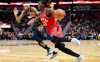 NEW ORLEANS, LOUISIANA - NOVEMBER 08: Pascal Siakam #43 of the Toronto Raptors is defended by Brandon Ingram #14 of the New Orleans Pelicans during a NBA game at the Smoothie King Center on November 08, 2019 in New Orleans, Louisiana. NOTE TO USER: User expressly acknowledges and agrees that, by downloading and or using this photograph, User is consenting to the terms and conditions of the Getty Images License Agreement.  (Photo by Sean Gardner/Getty Images)