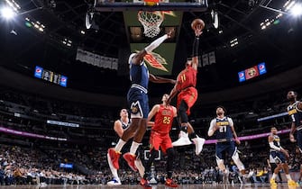 DENVER, CO - NOVEMBER 12: Trae Young #11 of the Atlanta Hawks drives to the basket during a game against the Denver Nuggets on November 12, 2019 at the Pepsi Center in Denver, Colorado. NOTE TO USER: User expressly acknowledges and agrees that, by downloading and/or using this Photograph, user is consenting to the terms and conditions of the Getty Images License Agreement. Mandatory Copyright Notice: Copyright 2019 NBAE (Photo by Garrett Ellwood/NBAE via Getty Images)