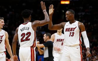 MIAMI, FLORIDA - NOVEMBER 12:  Jimmy Butler #22 of the Miami Heat celebrates with Bam Adebayo #13 against the Detroit Pistons during the second half at American Airlines Arena on November 12, 2019 in Miami, Florida. NOTE TO USER: User expressly acknowledges and agrees that, by downloading and/or using this photograph, user is consenting to the terms and conditions of the Getty Images License Agreement. (Photo by Michael Reaves/Getty Images)