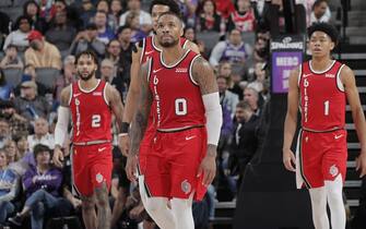 SACRAMENTO, CA - NOVEMBER 12: Damian Lillard #0 of the Portland Trail Blazers looks on ball against the Sacramento Kings on November 12, 2019 at Golden 1 Center in Sacramento, California. NOTE TO USER: User expressly acknowledges and agrees that, by downloading and or using this Photograph, user is consenting to the terms and conditions of the Getty Images License Agreement. Mandatory Copyright Notice: Copyright 2019 NBAE (Photo by Rocky Widner/NBAE via Getty Images)