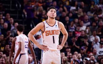 PHOENIX, AZ - NOVEMBER 12: Devin Booker #1 of the Phoenix Suns looks on during the game against the Los Angeles Lakers on November 12, 2019 at Talking Stick Resort Arena in Phoenix, Arizona. NOTE TO USER: User expressly acknowledges and agrees that, by downloading and or using this photograph, user is consenting to the terms and conditions of the Getty Images License Agreement. Mandatory Copyright Notice: Copyright 2019 NBAE (Photo by Michael Gonzales/NBAE via Getty Images)