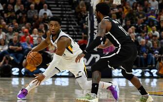 SALT LAKE CITY, UT - NOVEMBER 12: Donovan Mitchell #45 of the Utah Jazz attempts to drive around Kyrie Irving #11 of the Brooklyn Nets during a game at Vivint Smart Home Arena on November 12, 2019 in Salt Lake City, Utah. NOTE TO USER: User expressly acknowledges and agrees that, by downloading and/or using this photograph, user is consenting to the terms and conditions of the Getty Images License Agreement.  (Photo by Alex Goodlett/Getty Images)