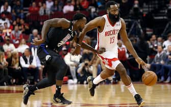 HOUSTON, TEXAS - NOVEMBER 13: James Harden #13 of the Houston Rockets brings the ball up court as Patrick Beverley #21 of the Los Angeles Clippers applies pressure during the first quarter at Toyota Center on November 13, 2019 in Houston, Texas. NOTE TO USER: User expressly acknowledges and agrees that, by downloading and/or using this photograph, user is consenting to the terms and conditions of the Getty Images License Agreement.  (Photo by Bob Levey/Getty Images)