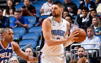 ORLANDO, FL - NOVEMBER 13: Nikola Vucevic #9 of the Orlando Magic handles the ball against the Philadelphia 76ers on November 13, 2019 at Amway Center in Orlando, Florida. NOTE TO USER: User expressly acknowledges and agrees that, by downloading and or using this photograph, User is consenting to the terms and conditions of the Getty Images License Agreement. Mandatory Copyright Notice: Copyright 2019 NBAE (Photo by Fernando Medina/NBAE via Getty Images)