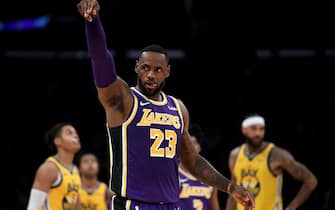 LOS ANGELES, CALIFORNIA - NOVEMBER 13:  LeBron James #23 of the Los Angeles Lakers celebrates his basket and Golden State Warriors foul during the first half at Staples Center on November 13, 2019 in Los Angeles, California.  NOTE TO USER: User expressly acknowledges and agrees that, by downloading and/or using this photograph, user is consenting to the terms and conditions of the Getty Images License Agreement. (Photo by Harry How/Getty Images)