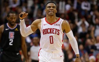 HOUSTON, TEXAS - NOVEMBER 13: Russell Westbrook #0 of the Houston Rockets reacts  after making a three point shot against the Los Angeles Clippers during the fourth quarter at Toyota Center on November 13, 2019 in Houston, Texas. NOTE TO USER: User expressly acknowledges and agrees that, by downloading and/or using this photograph, user is consenting to the terms and conditions of the Getty Images License Agreement.  (Photo by Bob Levey/Getty Images)