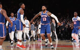 NEW YORK, NY - NOVEMBER 14: Frank Ntilikina #11 and Marcus Morris Sr. #13 of the New York Knicks celebrate during a game against the Dallas Mavericks on November 14, 2019 at Madison Square Garden in New York City, New York.  NOTE TO USER: User expressly acknowledges and agrees that, by downloading and or using this photograph, User is consenting to the terms and conditions of the Getty Images License Agreement. Mandatory Copyright Notice: Copyright 2019 NBAE  (Photo by Nathaniel S. Butler/NBAE via Getty Images)