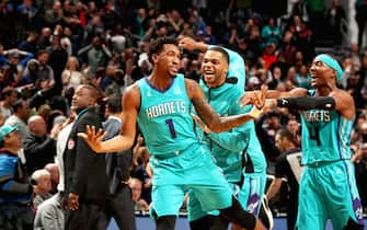 CHARLOTTE, NC - NOVEMBER 15: Charlotte Hornets players react to Malik Monk #1 of the Charlotte Hornets hitting the game winning shot against the Detroit Pistons on November 15, 2019 at Spectrum Center in Charlotte, North Carolina. NOTE TO USER: User expressly acknowledges and agrees that, by downloading and or using this photograph, User is consenting to the terms and conditions of the Getty Images License Agreement.  Mandatory Copyright Notice:  Copyright 2019 NBAE (Photo by Kent Smith/NBAE via Getty Images)