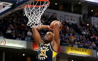 INDIANAPOLIS, INDIANA - NOVEMBER 16: Myles Turner #33 of the Indiana Pacers dunks the ball in the game against the Milwaukee Bucks during the fourth quarter at Bankers Life Fieldhouse on November 16, 2019 in Indianapolis, Indiana. NOTE TO USER: User expressly acknowledges and agrees that, by downloading and/or using this Photograph, user is consenting to the terms and conditions of the Getty Images License Agreement. (Photo by Justin Casterline/Getty Images)
