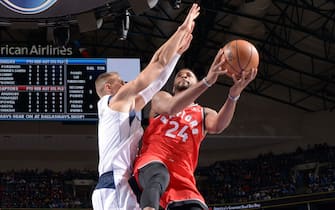 DALLAS, TX - NOVEMBER 16: Norman Powell #24 of the Toronto Raptors shoots the ball against the Dallas Mavericks on November 16, 2019 at the American Airlines Center in Dallas, Texas. NOTE TO USER: User expressly acknowledges and agrees that, by downloading and or using this photograph, User is consenting to the terms and conditions of the Getty Images License Agreement. Mandatory Copyright Notice: Copyright 2019 NBAE (Photo by Glenn James/NBAE via Getty Images)