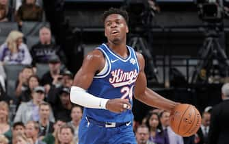 SACRAMENTO, CA - NOVEMBER 17: Buddy Hield #24 of the Sacramento Kings handles the ball against the Boston Celtics on November 17, 2019 at Golden 1 Center in Sacramento, California. NOTE TO USER: User expressly acknowledges and agrees that, by downloading and or using this Photograph, user is consenting to the terms and conditions of the Getty Images License Agreement. Mandatory Copyright Notice: Copyright 2019 NBAE (Photo by Rocky Widner/NBAE via Getty Images)