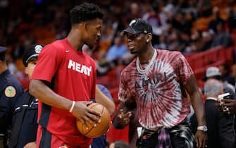 1188107463 MIAMI, FLORIDA - NOVEMBER 16: Jimmy Butler #22 of the Miami Heat talks with Paul Pogba of Manchester United prior to the game against the New Orleans Pelicans at American Airlines Arena on November 16, 2019 in Miami, Florida. NOTE TO USER: User expressly acknowledges and agrees that, by downloading and/or using this photograph, user is consenting to the terms and conditions of the Getty Images License Agreement. (Photo by Michael Reaves/Getty Images)