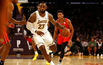 1188324314 LOS ANGELES, CALIFORNIA - NOVEMBER 17: LeBron James #23 of the Los Angeles Lakers moves the ball down the court during the second half of a game against the Atlanta Hawks at Staples Center on November 17, 2019 in Los Angeles, California. NOTE TO USER: User expressly acknowledges and agrees that, by downloading and or using this photograph, User is consenting to the terms and conditions of the Getty Images License Agreement. (Photo by Katharine Lotze/Getty Images)
